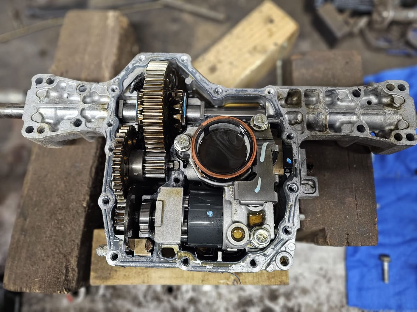 A Countax transaxle split open on the workshop bench