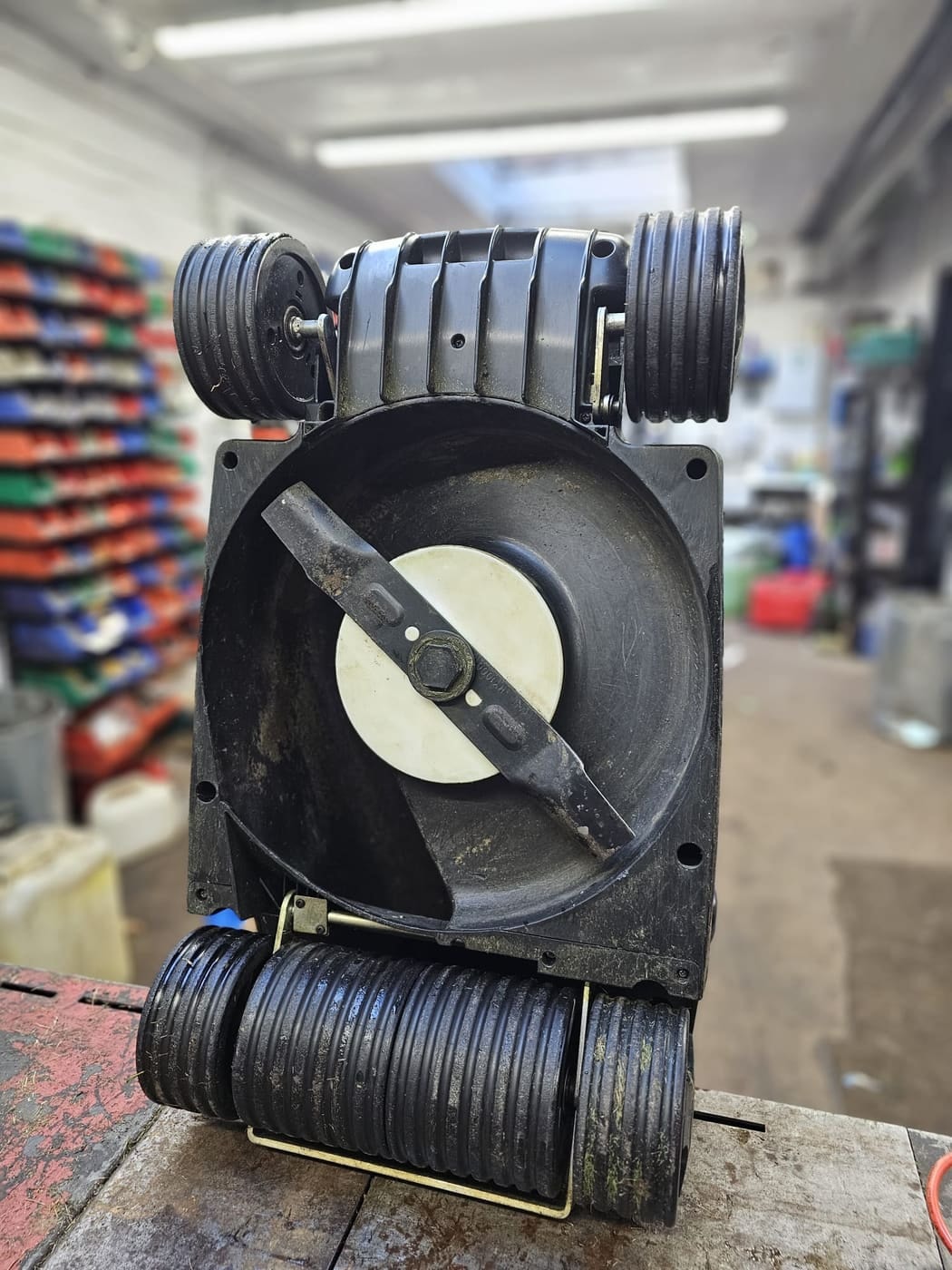 The clean underside of a rebuilt Hayter Envoy with its blade refitted